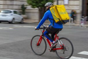 A Glovo delivery driver. [Image credit: Angel Ganev/Flickr]