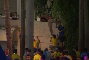 Torcedores escalam grades de segurança na final da Copa América