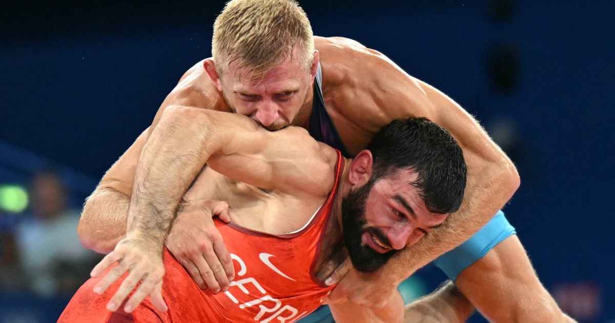 O lutador de luta livre de 74 kg da equipe dos EUA, Kyle Dake, ganha o bronze nas Olimpíadas de Paris